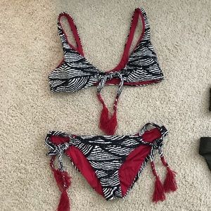 BECCA black, white, and red bikini